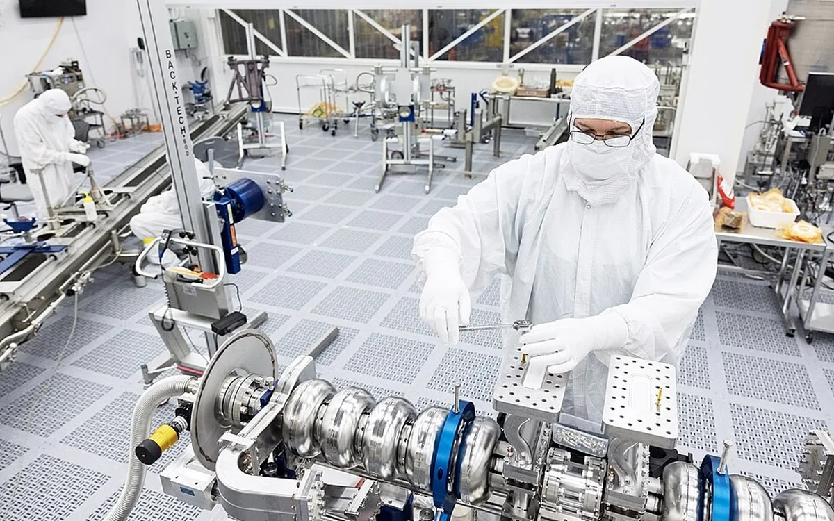 Engineer working in a semiconductor cleanroom